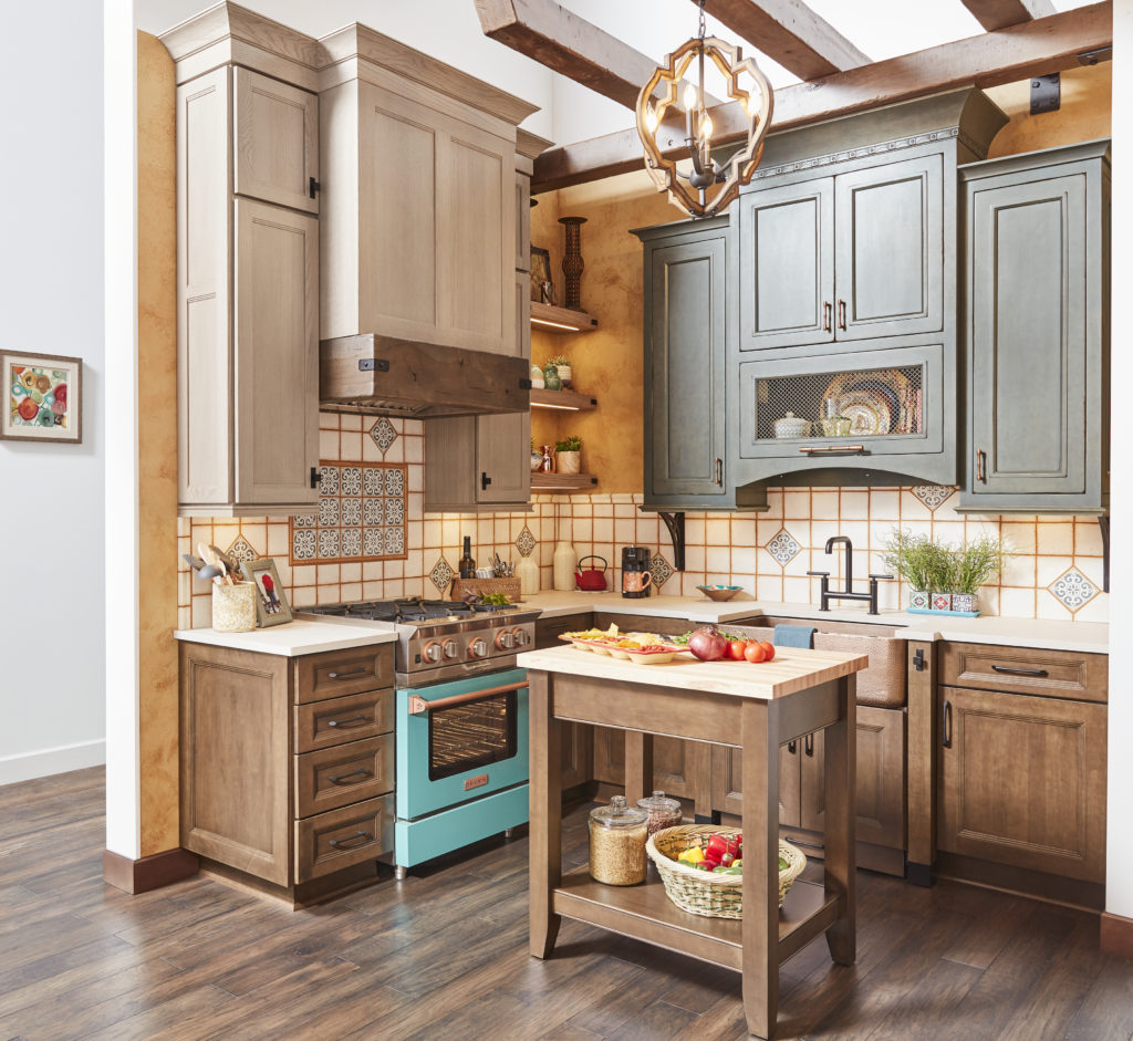 warm stain kitchen cabinets, colorful decorative tile, exposed wood beams, wrought iron