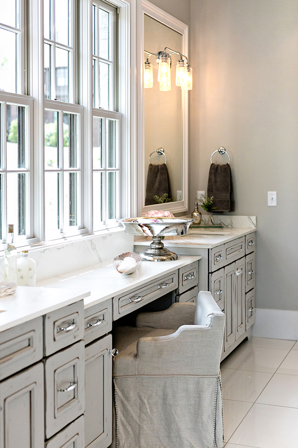 light gray bathroom cabinets and makeup vanity