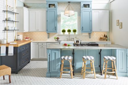 Light blue and white shaker kitchen cabinets and island