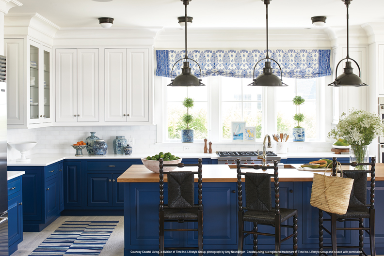 dark blue kitchen island and lower cabinets
