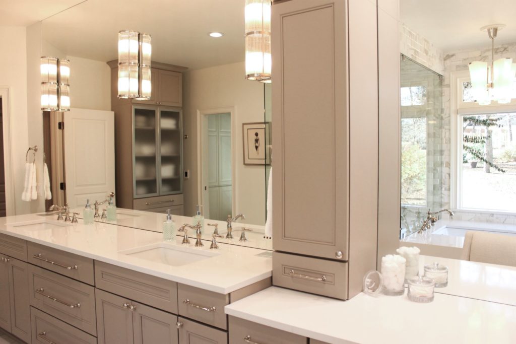 bathroom with light gray cabinets