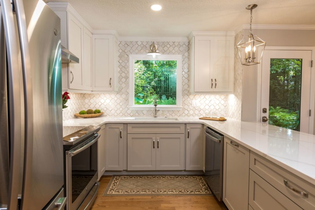 small kitchen with white cabinets