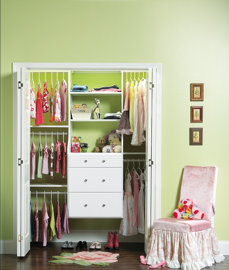Childs closet with white cabinetry